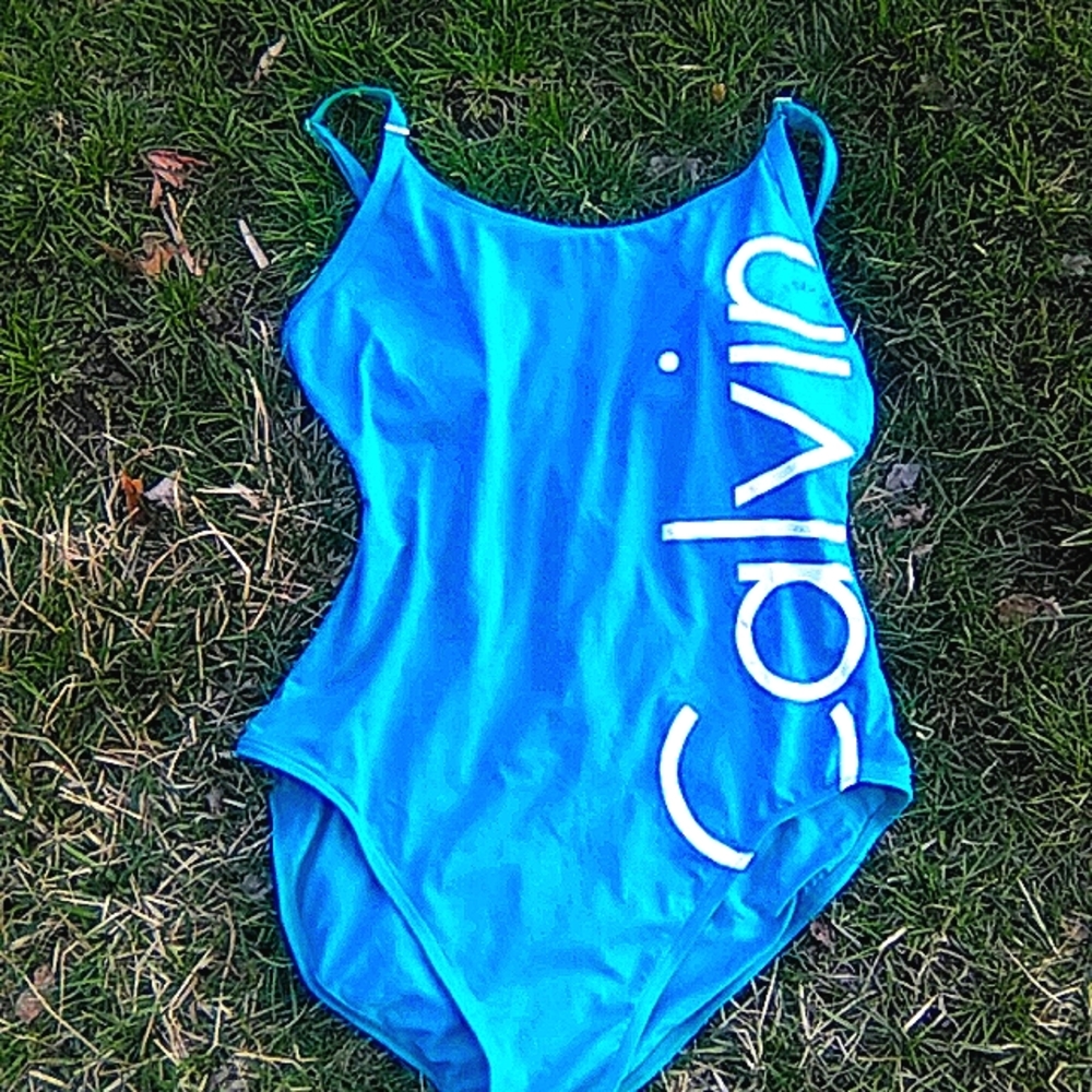 I'm selling a Calvin Klein Green-blue Swimming suite for cheap price